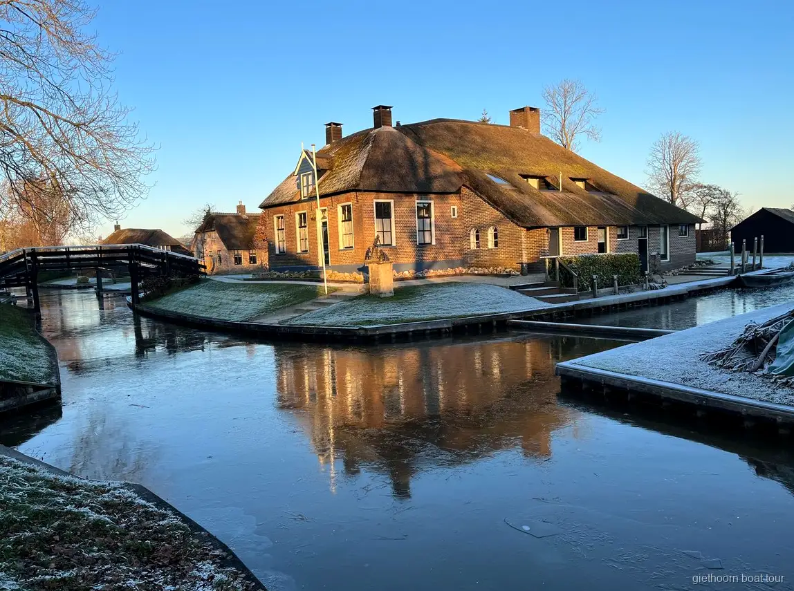 Guided walk through Giethoorn village center on the small group tour